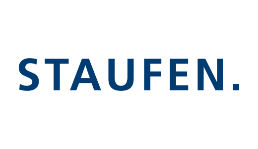 Das Bild zeigt den Schriftzug "STAUFEN." in dunkler blauer Farbe auf hellem, beigem Hintergrund. Es handelt sich um das Logo der Firma Staufen.