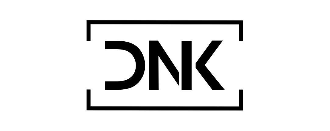 Das Bild zeigt ein einfaches schwarzes und weißes Logo mit den Buchstaben "Dnk" in der Mitte. Das Logo wird von einem schwarzen Rechteck umschlossen, wodurch ein sauberes und minimalistisches Design entsteht. Die Verwendung einer fetten, serifenlosen Schrift für die Buchstaben verleiht dem Gesamtdesign einen modernen und professionellen Touch. Das Logo scheint ein Platzhalter für eine Website oder Marke zu sein, da es keinen zusätzlichen Text oder Elemente enthält, die mehr Kontext bieten würden.