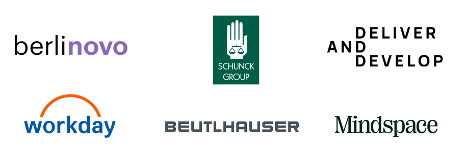 Das Bild zeigt eine Sammlung von fünf verschiedenen Logos, die jeweils für ein Unternehmen oder eine Organisation stehen. Die Logos sind in einem Raster angeordnet, wobei sich zwei Logos in der oberen Reihe und drei Logos in der unteren Reihe befinden. Zu den Logos gehören das Wort „berlinovo“ in Lila, das „SCHUNC KONING“-Logo in Grün und das „workday“-Logo in Orange. Das dritte Logo ist das „Beutlhäuser“-Logo in Schwarz, und das vierte Logo ist das „Mindspace“-Logo in Schwarz. Das fünfte Logo ist das „Berlinovo“-Logo in Lila.